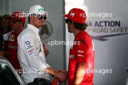 (L to R): Nico Hulkenberg (GER) Sahara Force India F1 and Fernando Alonso (ESP) Ferrari. 06.04.2014. Formula 1 World Championship, Rd 3, Bahrain Grand Prix, Sakhir, Bahrain, Race Day.