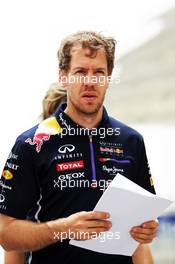 Sebastian Vettel (GER) Red Bull Racing walks the circuit. 03.04.2014. Formula 1 World Championship, Rd 3, Bahrain Grand Prix, Sakhir, Bahrain, Preparation Day.