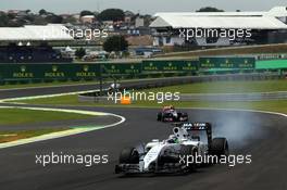 Felipe Massa (BRA) Williams FW36 locks up under braking. 07.11.2014. Formula 1 World Championship, Rd 18, Brazilian Grand Prix, Sao Paulo, Brazil, Practice Day.