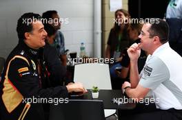 (L to R): Federico Gastaldi (ARG) Lotus F1 Team Deputy Team Principal with Eric Boullier (FRA) McLaren Racing Director. 07.11.2014. Formula 1 World Championship, Rd 18, Brazilian Grand Prix, Sao Paulo, Brazil, Practice Day.