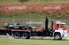 The Sahara Force India F1 VJM07 of Daniel Juncadella (ESP) Sahara Force India F1 Team Test and Reserve Driver is recovered back to the pits on the back of a truck. 07.11.2014. Formula 1 World Championship, Rd 18, Brazilian Grand Prix, Sao Paulo, Brazil, Practice Day.
