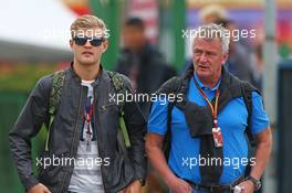 (L to R): Marcus Ericsson (SWE) Caterham with Eje Elgh (SWE) Driver Manager. 07.11.2014. Formula 1 World Championship, Rd 18, Brazilian Grand Prix, Sao Paulo, Brazil, Practice Day.