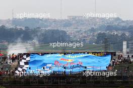 A large banner for Red Bull Racing. 07.11.2014. Formula 1 World Championship, Rd 18, Brazilian Grand Prix, Sao Paulo, Brazil, Practice Day.