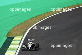Kevin Magnussen (DEN) McLaren MP4-29 sends sparks flying. 07.11.2014. Formula 1 World Championship, Rd 18, Brazilian Grand Prix, Sao Paulo, Brazil, Practice Day.