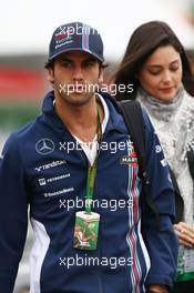 Felipe Nasr (BRA) Williams Test and Reserve Driver with his girlfriend Giulia Maria Testoni (BRA). 07.11.2014. Formula 1 World Championship, Rd 18, Brazilian Grand Prix, Sao Paulo, Brazil, Practice Day.