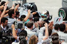 Lewis Hamilton (GBR) Mercedes AMG F1 celebrates his second position in parc ferme. 09.11.2014. Formula 1 World Championship, Rd 18, Brazilian Grand Prix, Sao Paulo, Brazil, Race Day.