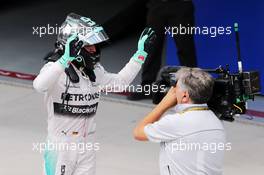 Race winner Nico Rosberg (GER) Mercedes AMG F1 celebrates in parc ferme. 09.11.2014. Formula 1 World Championship, Rd 18, Brazilian Grand Prix, Sao Paulo, Brazil, Race Day.