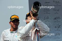 Felipe Massa (BRA) Williams celebrates his third position on the podium. 09.11.2014. Formula 1 World Championship, Rd 18, Brazilian Grand Prix, Sao Paulo, Brazil, Race Day.