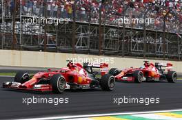 Kimi Raikkonen (FIN) Ferrari F14-T leads team mate Fernando Alonso (ESP) Ferrari F14-T. 09.11.2014. Formula 1 World Championship, Rd 18, Brazilian Grand Prix, Sao Paulo, Brazil, Race Day.