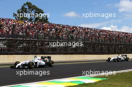 Felipe Massa (BRA) Williams FW36 and Valtteri Bottas (FIN) Williams FW36. 09.11.2014. Formula 1 World Championship, Rd 18, Brazilian Grand Prix, Sao Paulo, Brazil, Race Day.