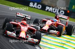 Kimi Raikkonen (FIN) Ferrari F14-T leads Fernando Alonso (ESP) Ferrari F14-T. 09.11.2014. Formula 1 World Championship, Rd 18, Brazilian Grand Prix, Sao Paulo, Brazil, Race Day.