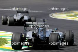 Lewis Hamilton (GBR), Mercedes AMG F1 Team and Nico Rosberg (GER), Mercedes AMG F1 Team  09.11.2014. Formula 1 World Championship, Rd 18, Brazilian Grand Prix, Sao Paulo, Brazil, Race Day.