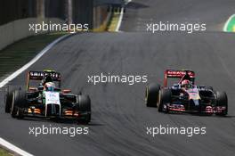 Sergio Perez (MEX), Sahara Force India and Daniil Kvyat (RUS), Scuderia Toro Rosso  09.11.2014. Formula 1 World Championship, Rd 18, Brazilian Grand Prix, Sao Paulo, Brazil, Race Day.