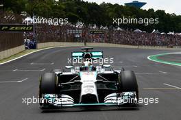 Lewis Hamilton (GBR) Mercedes AMG F1 W05. 09.11.2014. Formula 1 World Championship, Rd 18, Brazilian Grand Prix, Sao Paulo, Brazil, Race Day.