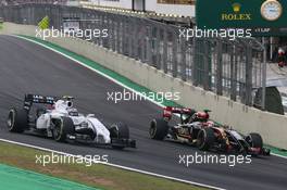 Valtteri Bottas (FIN), Williams F1 Team and Pastor Maldonado (VEN), Lotus F1 Team  09.11.2014. Formula 1 World Championship, Rd 18, Brazilian Grand Prix, Sao Paulo, Brazil, Race Day.