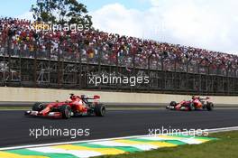 Kimi Raikkonen (FIN) leads Fernando Alonso (ESP) Ferrari F14-T. 09.11.2014. Formula 1 World Championship, Rd 18, Brazilian Grand Prix, Sao Paulo, Brazil, Race Day.