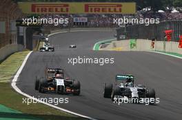 Nico Hulkenberg (GER), Sahara Force India and Nico Rosberg (GER), Mercedes AMG F1 Team  09.11.2014. Formula 1 World Championship, Rd 18, Brazilian Grand Prix, Sao Paulo, Brazil, Race Day.