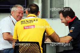 (L to R): Dr Helmut Marko (AUT) Red Bull Motorsport Consultant with Cyril Abiteboul (FRA) Renault Sport F1 Managing Director and Christian Horner (GBR) Red Bull Racing Team Principal. 08.11.2014. Formula 1 World Championship, Rd 18, Brazilian Grand Prix, Sao Paulo, Brazil, Qualifying Day.