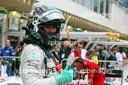 Nico Rosberg (GER) Mercedes AMG F1 celebrates his pole position in parc ferme. 08.11.2014. Formula 1 World Championship, Rd 18, Brazilian Grand Prix, Sao Paulo, Brazil, Qualifying Day.
