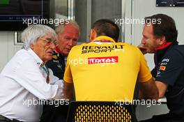 (L to R): Bernie Ecclestone (GBR) with Dr Helmut Marko (AUT) Red Bull Motorsport Consultant; Cyril Abiteboul (FRA) Renault Sport F1 Managing Director; and Christian Horner (GBR) Red Bull Racing Team Principal. 08.11.2014. Formula 1 World Championship, Rd 18, Brazilian Grand Prix, Sao Paulo, Brazil, Qualifying Day.