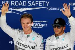 Nico Rosberg (GER), Mercedes AMG F1 Team and Lewis Hamilton (GBR), Mercedes AMG F1 Team  08.11.2014. Formula 1 World Championship, Rd 18, Brazilian Grand Prix, Sao Paulo, Brazil, Qualifying Day.