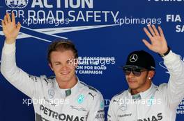 Nico Rosberg (GER), Mercedes AMG F1 Team and Lewis Hamilton (GBR), Mercedes AMG F1 Team  08.11.2014. Formula 1 World Championship, Rd 18, Brazilian Grand Prix, Sao Paulo, Brazil, Qualifying Day.