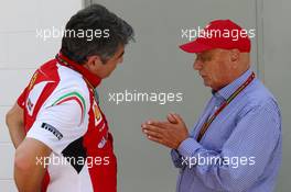 (L to R): Marco Mattiacci (ITA) Ferrari Team Principal with Niki Lauda (AUT) Mercedes Non-Executive Chairman. 09.11.2014. Formula 1 World Championship, Rd 18, Brazilian Grand Prix, Sao Paulo, Brazil, Race Day.