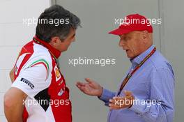 (L to R): Marco Mattiacci (ITA) Ferrari Team Principal with Niki Lauda (AUT) Mercedes Non-Executive Chairman. 09.11.2014. Formula 1 World Championship, Rd 18, Brazilian Grand Prix, Sao Paulo, Brazil, Race Day.