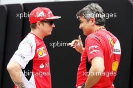 (L to R): Kimi Raikkonen (FIN) Ferrari with Marco Mattiacci (ITA) Ferrari Team Principal. 06.11.2014. Formula 1 World Championship, Rd 18, Brazilian Grand Prix, Sao Paulo, Brazil, Preparation Day.
