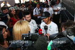 Lewis Hamilton (GBR) Mercedes AMG F1 with the media. 06.11.2014. Formula 1 World Championship, Rd 18, Brazilian Grand Prix, Sao Paulo, Brazil, Preparation Day.