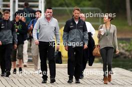 (L to R): Eric Boullier (FRA) McLaren Racing Director with Jenson Button (GBR) McLaren and his girlfriend Jessica Michibata (JPN). 06.06.2014. Formula 1 World Championship, Rd 7, Canadian Grand Prix, Montreal, Canada, Practice Day.