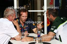 (L to R): Dr Helmut Marko (AUT) Red Bull Motorsport Consultant with Christian Horner (GBR) Red Bull Racing Team Principal and Cyril Abiteboul (FRA) Caterham F1 Team Principal. 06.06.2014. Formula 1 World Championship, Rd 7, Canadian Grand Prix, Montreal, Canada, Practice Day.