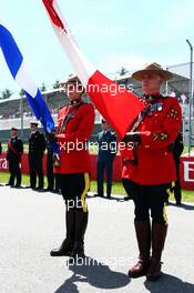 Canadian mounted police on the grid. 08.06.2014. Formula 1 World Championship, Rd 7, Canadian Grand Prix, Montreal, Canada, Race Day.