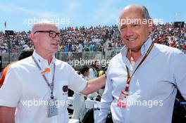 (L to R): Derek Daly (IRE) FIA Steward with Ron Dennis (GBR) McLaren Executive Chairman on the grid. 08.06.2014. Formula 1 World Championship, Rd 7, Canadian Grand Prix, Montreal, Canada, Race Day.