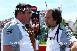 (L to R): Eric Boullier (FRA) McLaren Racing Director with Ciaron Pilbeam (GBR) McLaren Chief Race Engineer on the grid. 08.06.2014. Formula 1 World Championship, Rd 7, Canadian Grand Prix, Montreal, Canada, Race Day.