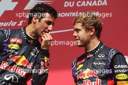 The podium (L to R): Race winner Daniel Ricciardo (AUS) Red Bull Racing with third placed team mate Sebastian Vettel (GER) Red Bull Racing. 08.06.2014. Formula 1 World Championship, Rd 7, Canadian Grand Prix, Montreal, Canada, Race Day.