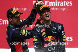 1st place Daniel Ricciardo (AUS) Red Bull Racing with 3rd place Sebastian Vettel (GER) Red Bull Racing. 08.06.2014. Formula 1 World Championship, Rd 7, Canadian Grand Prix, Montreal, Canada, Race Day.