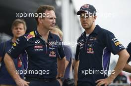 (L to R): Christian Horner (GBR) Red Bull Racing Team Principal with Sebastian Vettel (GER) Red Bull Racing. 08.06.2014. Formula 1 World Championship, Rd 7, Canadian Grand Prix, Montreal, Canada, Race Day.