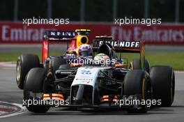 Sergio Perez (MEX) Sahara Force India F1 VJM07 leads Daniel Ricciardo (AUS) Red Bull Racing RB10. 08.06.2014. Formula 1 World Championship, Rd 7, Canadian Grand Prix, Montreal, Canada, Race Day.
