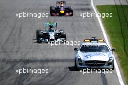 Nico Rosberg (GER) Mercedes AMG F1 W05 leads behind the FIA Safety Car. 08.06.2014. Formula 1 World Championship, Rd 7, Canadian Grand Prix, Montreal, Canada, Race Day.