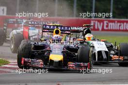 Daniel Ricciardo (AUS), Red Bull Racing overtakes Sergio Perez (MEX), Sahara Force India  08.06.2014. Formula 1 World Championship, Rd 7, Canadian Grand Prix, Montreal, Canada, Race Day.