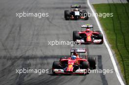 Fernando Alonso (ESP) Ferrari F14-T leads Kimi Raikkonen (FIN) Ferrari F14-T. 08.06.2014. Formula 1 World Championship, Rd 7, Canadian Grand Prix, Montreal, Canada, Race Day.