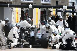 Jenson Button (GBR) McLaren MP4-29 makes a pit stop. 08.06.2014. Formula 1 World Championship, Rd 7, Canadian Grand Prix, Montreal, Canada, Race Day.
