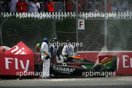 Sergio Perez (MEX) Sahara Force India F1 VJM07 crashed out on the final lap of the race. 08.06.2014. Formula 1 World Championship, Rd 7, Canadian Grand Prix, Montreal, Canada, Race Day.