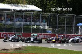 Start of the race, Nico Rosberg (GER), Mercedes AMG F1 Team and Lewis Hamilton (GBR), Mercedes AMG F1 Team  08.06.2014. Formula 1 World Championship, Rd 7, Canadian Grand Prix, Montreal, Canada, Race Day.