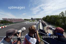 Photographers shoot at the hairpin. 08.06.2014. Formula 1 World Championship, Rd 7, Canadian Grand Prix, Montreal, Canada, Race Day.