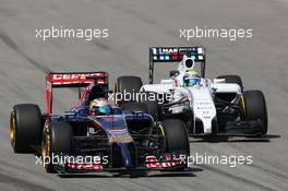 Jean-Eric Vergne (FRA) Scuderia Toro Rosso STR9 and Felipe Massa (BRA) Williams FW36 battle for position. 08.06.2014. Formula 1 World Championship, Rd 7, Canadian Grand Prix, Montreal, Canada, Race Day.