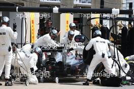 Jenson Button (GBR) McLaren MP4-29 makes a pit stop. 08.06.2014. Formula 1 World Championship, Rd 7, Canadian Grand Prix, Montreal, Canada, Race Day.