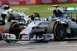 Nico Rosberg (GER), Mercedes AMG F1 Team and Lewis Hamilton (GBR), Mercedes AMG F1 Team  08.06.2014. Formula 1 World Championship, Rd 7, Canadian Grand Prix, Montreal, Canada, Race Day.
