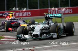 Nico Rosberg (GER), Mercedes AMG F1 Team and Daniel Ricciardo (AUS), Red Bull Racing  08.06.2014. Formula 1 World Championship, Rd 7, Canadian Grand Prix, Montreal, Canada, Race Day.